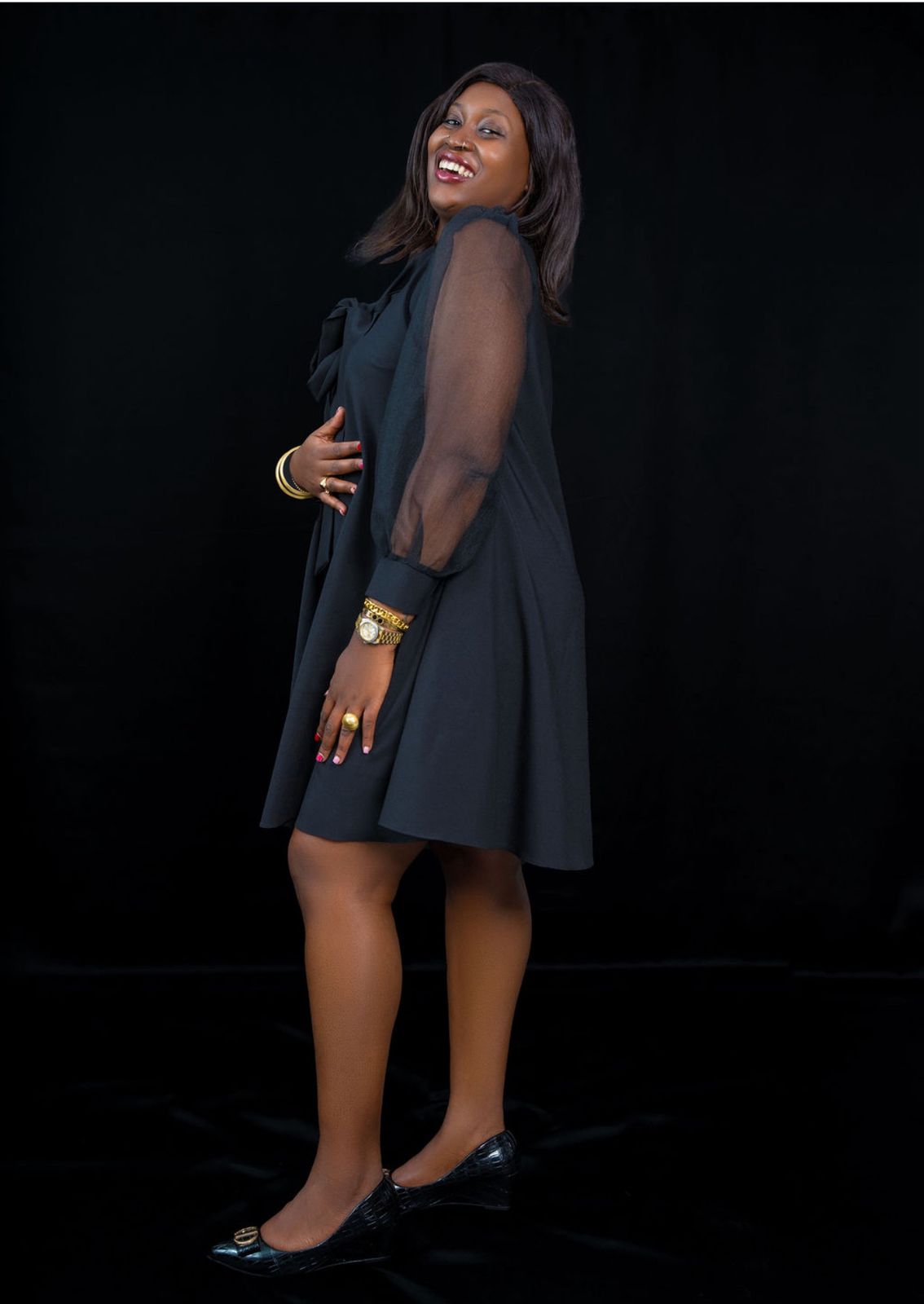 Elegant Black A-Line Dress with Bow-Tie Neckline & Sheer Puff Sleeves