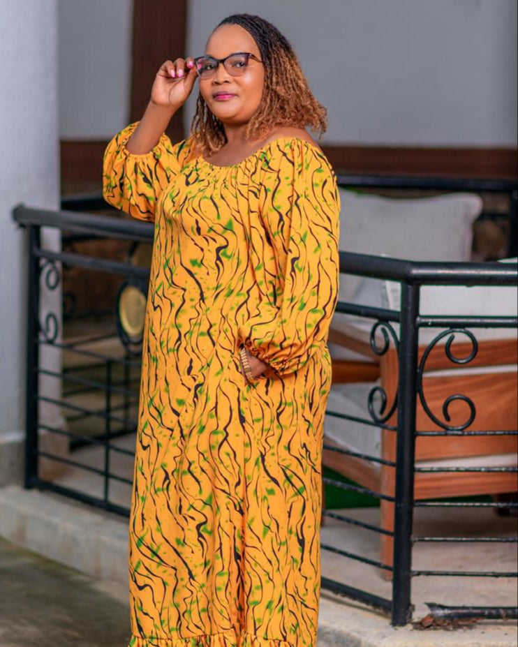 Vibrant Mustard-Yellow Maxi Dress with Abstract Prints, Long Sleeves & Ruffled Hem