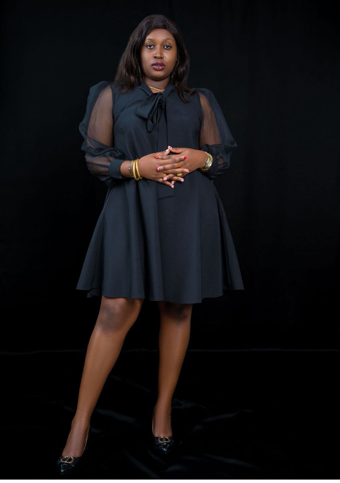 Elegant Black A-Line Dress with Bow-Tie Neckline & Sheer Puff Sleeves