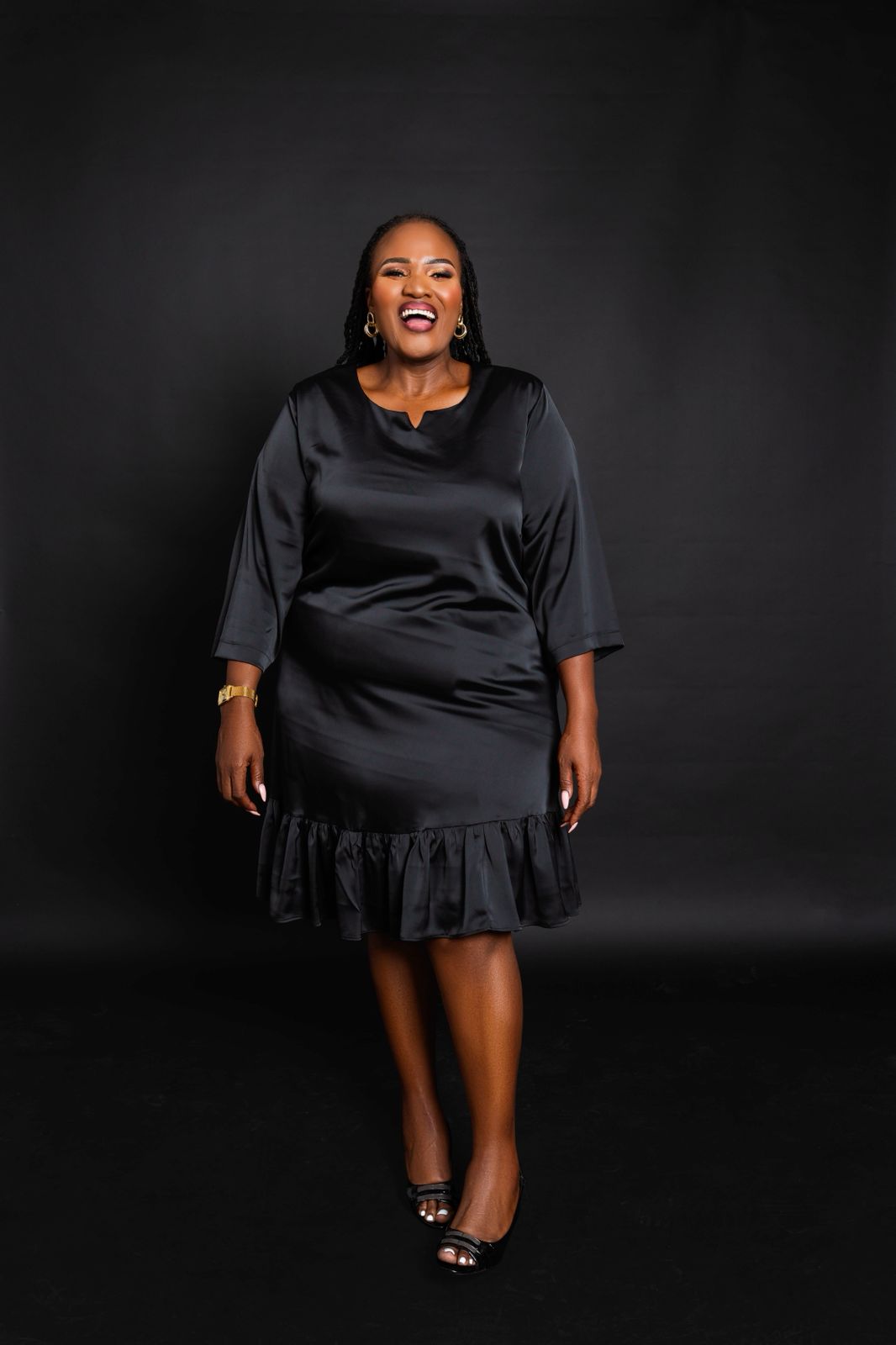 Elegant Black Satin Short Dress with Three-Quarter Sleeves & Ruffled Hem