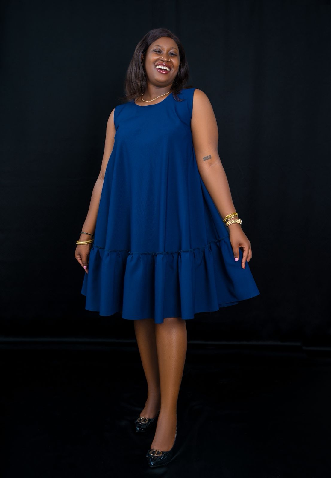Chic Sleeveless Navy Blue Dress with Ruffled Hem